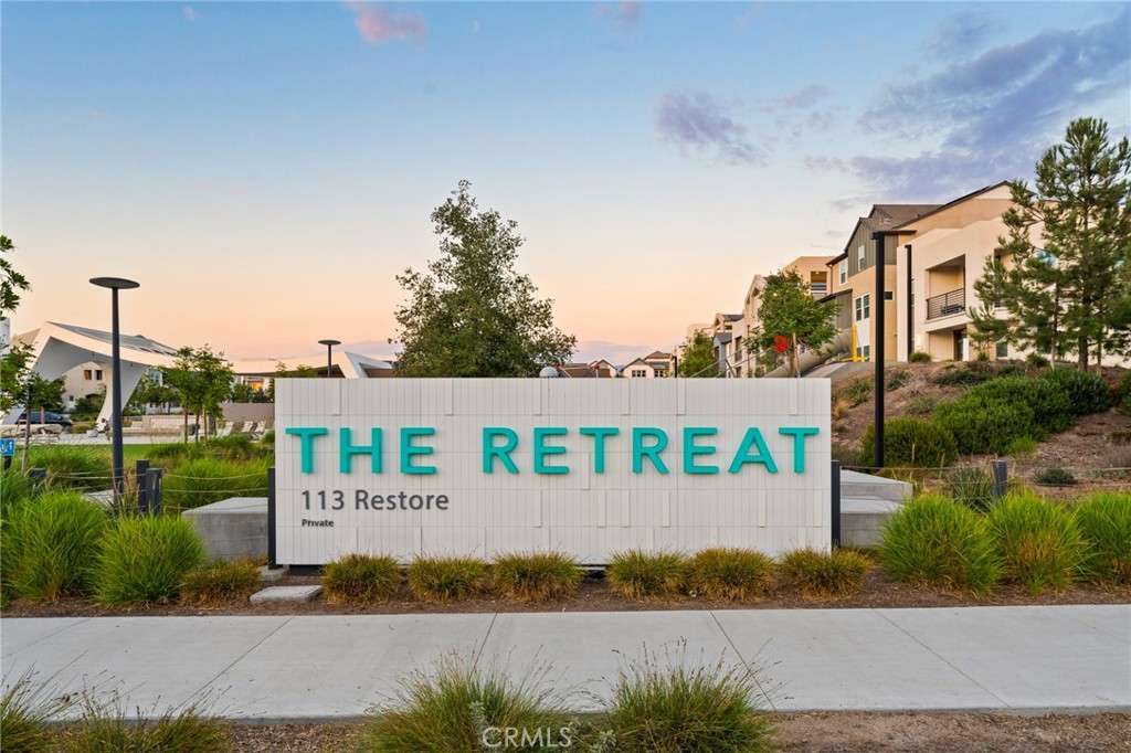 127 Restore Irvine, CA 92618 - Photo 40 of 65 a sign on the side of a road