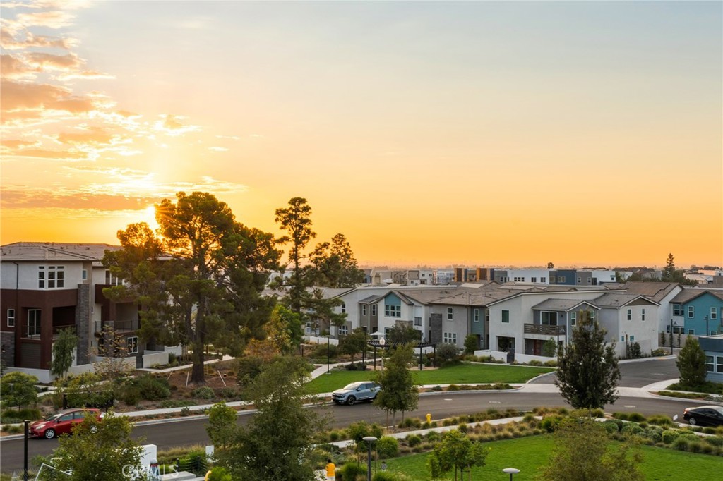 127 Restore Irvine, CA 92618 - Photo 47 of 65 a view of residential houses with cars parked in front of house