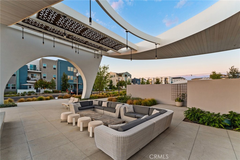 127 Restore Irvine, CA 92618 - Photo 48 of 65 a view of a couches and tables in the patio