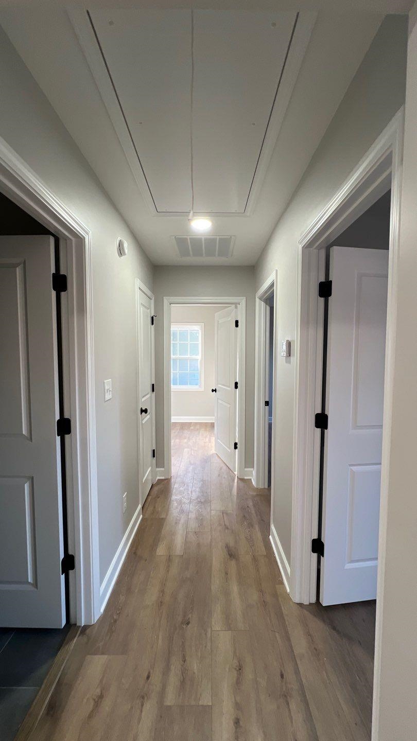 4411 Helene Road Memphis, TN 38117 - Photo 7 of 13 a view of a hallway with wooden floor