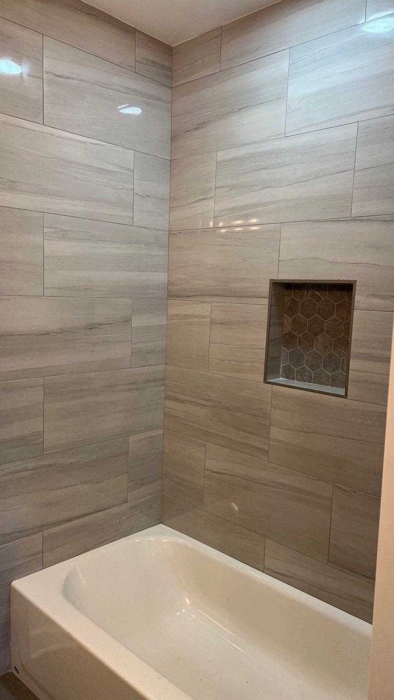 4411 Helene Road Memphis, TN 38117 - Photo 9 of 13 a bathroom with a bathtub