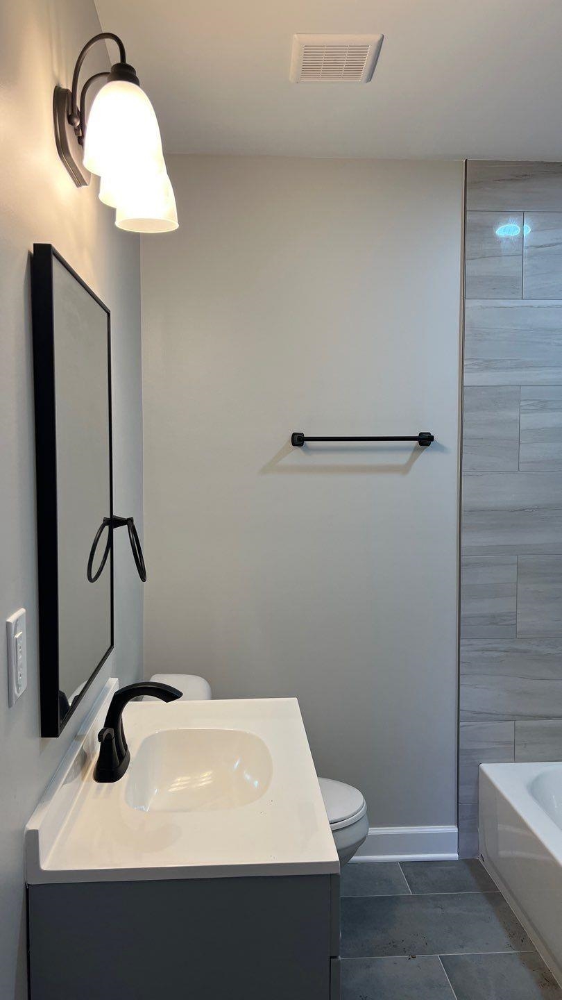 4411 Helene Road Memphis, TN 38117 - Photo 10 of 13 a bathroom with a sink and a toilet