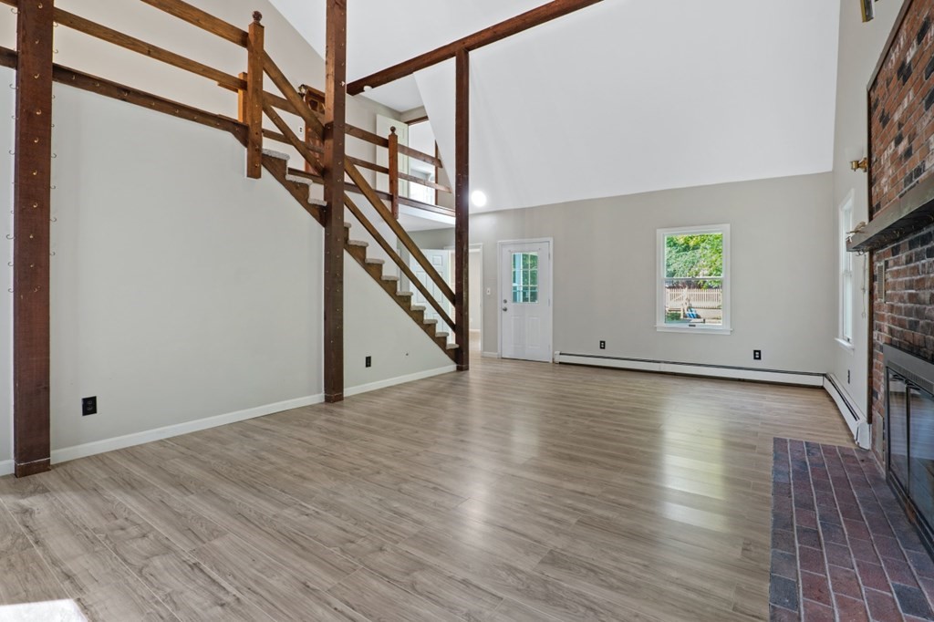 549 Main Street Townsend, MA 01474 - Photo 12 of 41 a view of entryway with stairs and wooden floor