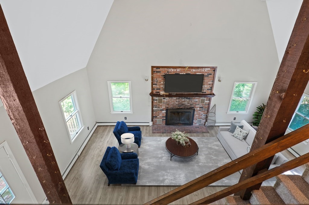 549 Main Street Townsend, MA 01474 - Photo 13 of 41 a living room with furniture and a fireplace