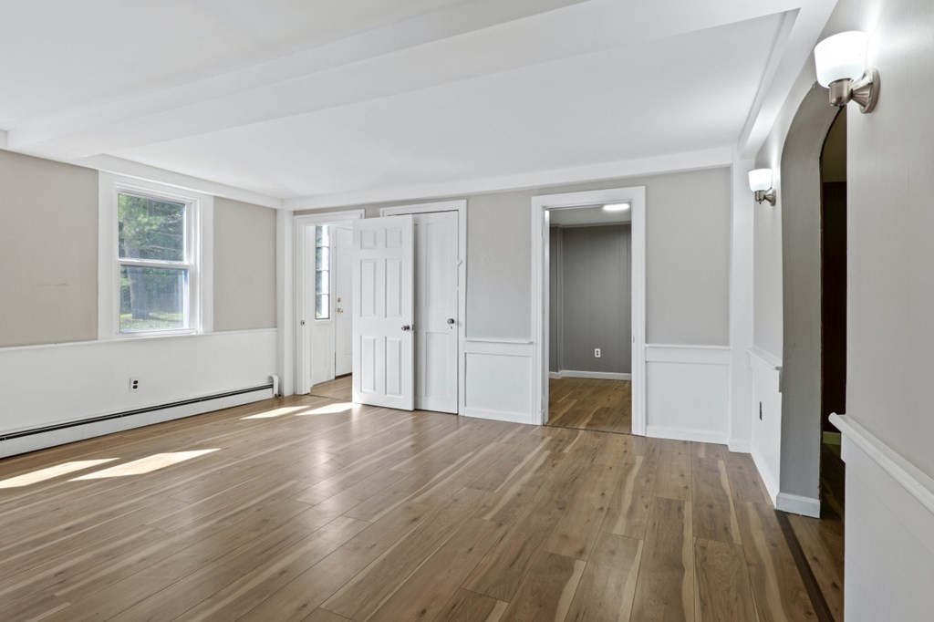 549 Main Street Townsend, MA 01474 - Photo 18 of 41 wooden floor in an empty room with a window