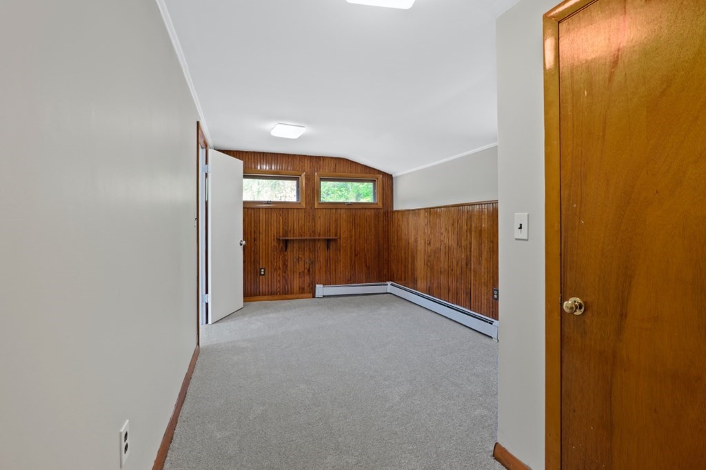 549 Main Street Townsend, MA 01474 - Photo 22 of 41 an empty room with windows and cabinet