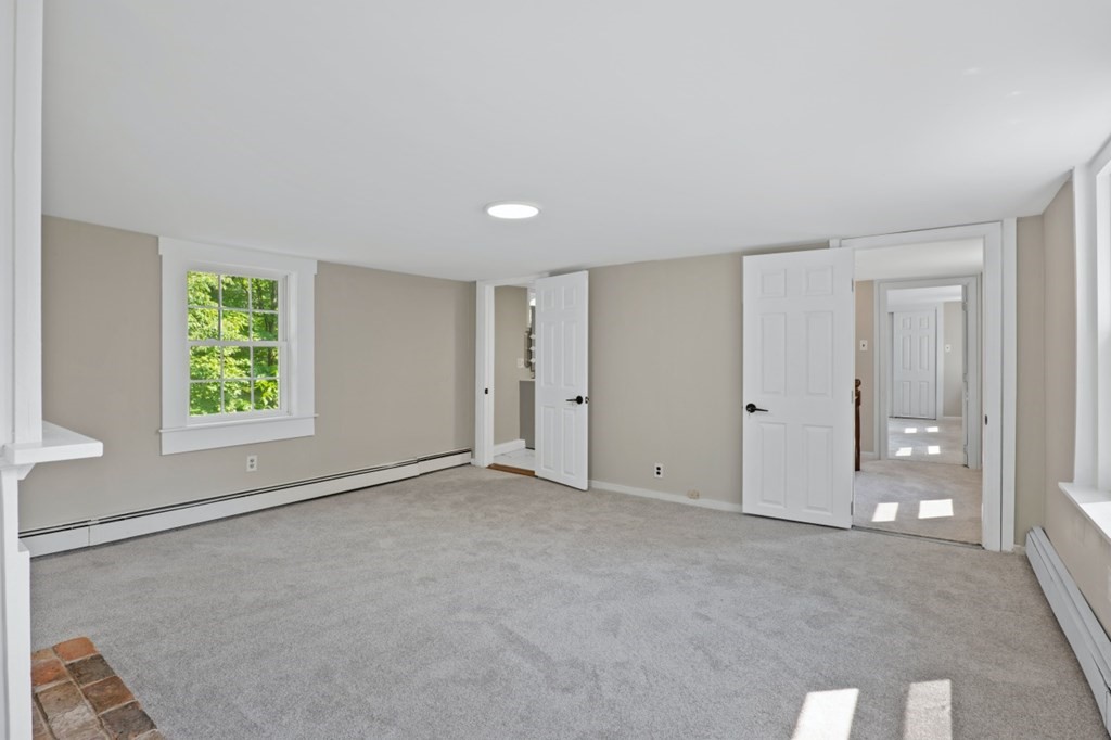 549 Main Street Townsend, MA 01474 - Photo 27 of 41 an empty room with windows and closet