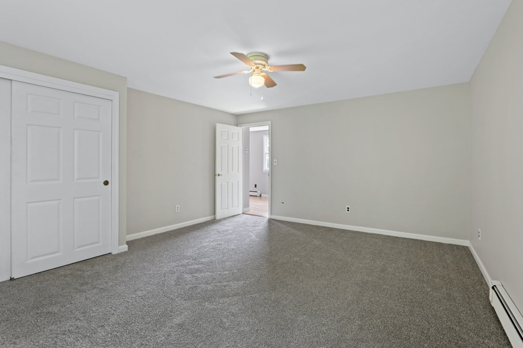 549 Main Street Townsend, MA 01474 - Photo 31 of 41 a view of an empty room with a ceiling fan