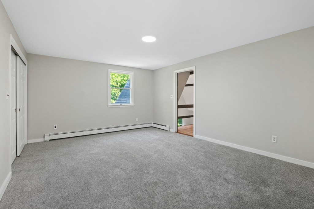 549 Main Street Townsend, MA 01474 - Photo 34 of 41 a view of an empty room with a window