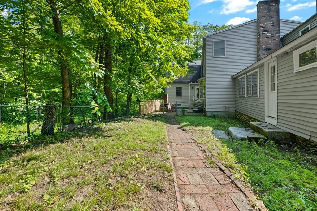 549 Main Street Townsend, MA 01474 - Photo 36 of 41 a backyard of a house with lots of green space
