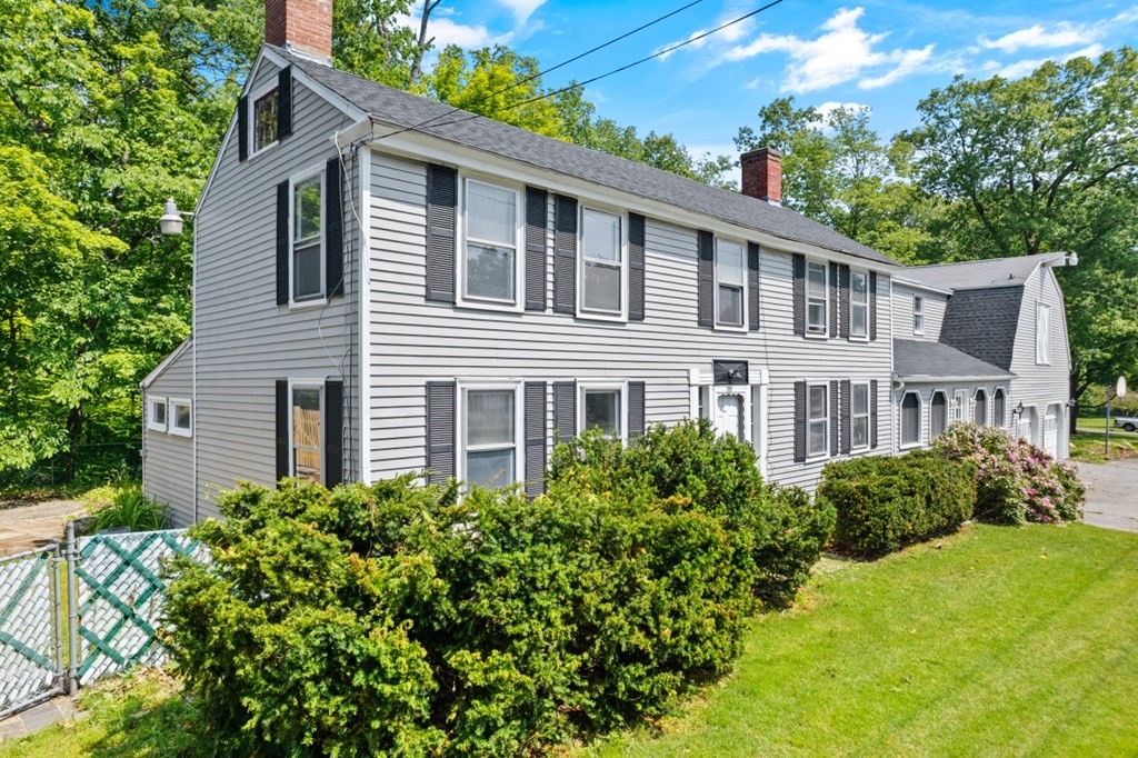 549 Main Street Townsend, MA 01474 - Photo 40 of 41 a front view of a house with a garden