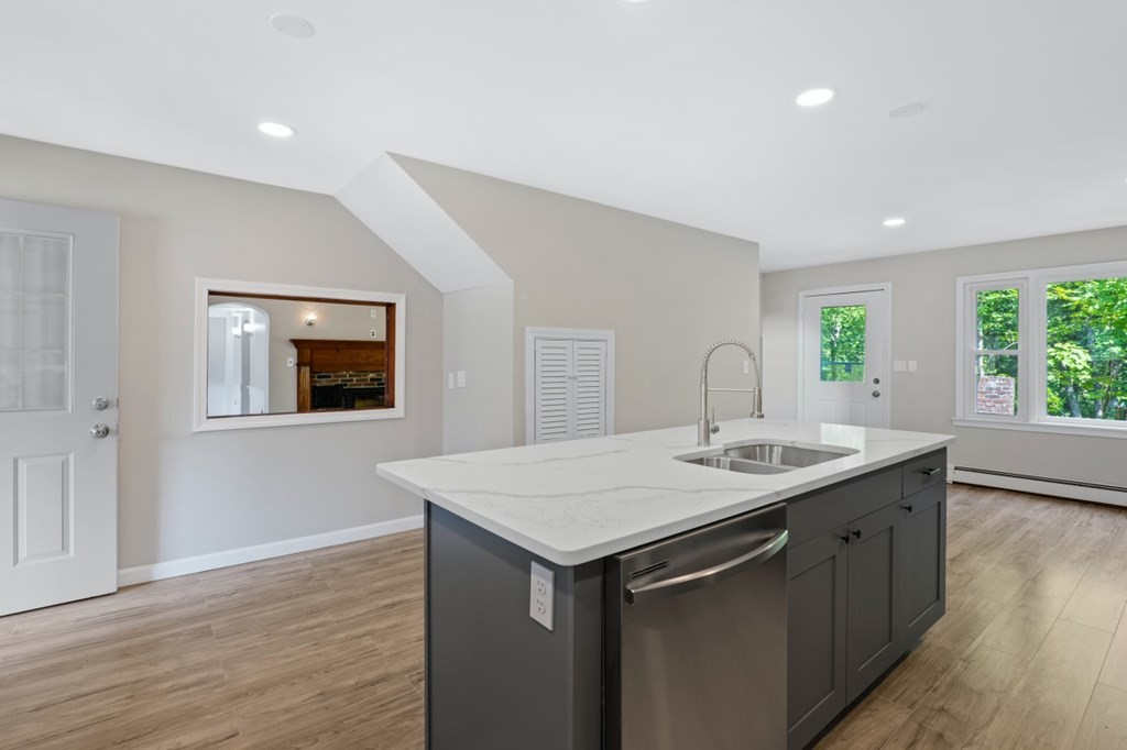 549 Main Street Townsend, MA 01474 - Photo 6 of 41 a kitchen with a sink and wooden floor