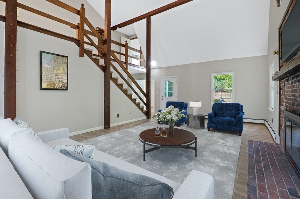 549 Main Street Townsend, MA 01474 - Photo 10 of 41 a living room with furniture and a wooden floor