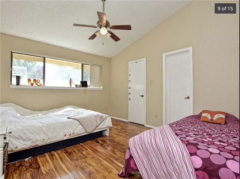 806 West 24th Street, Unit 331 Austin, TX 78705 - Photo 5 of 12 a bedroom with a bed and window