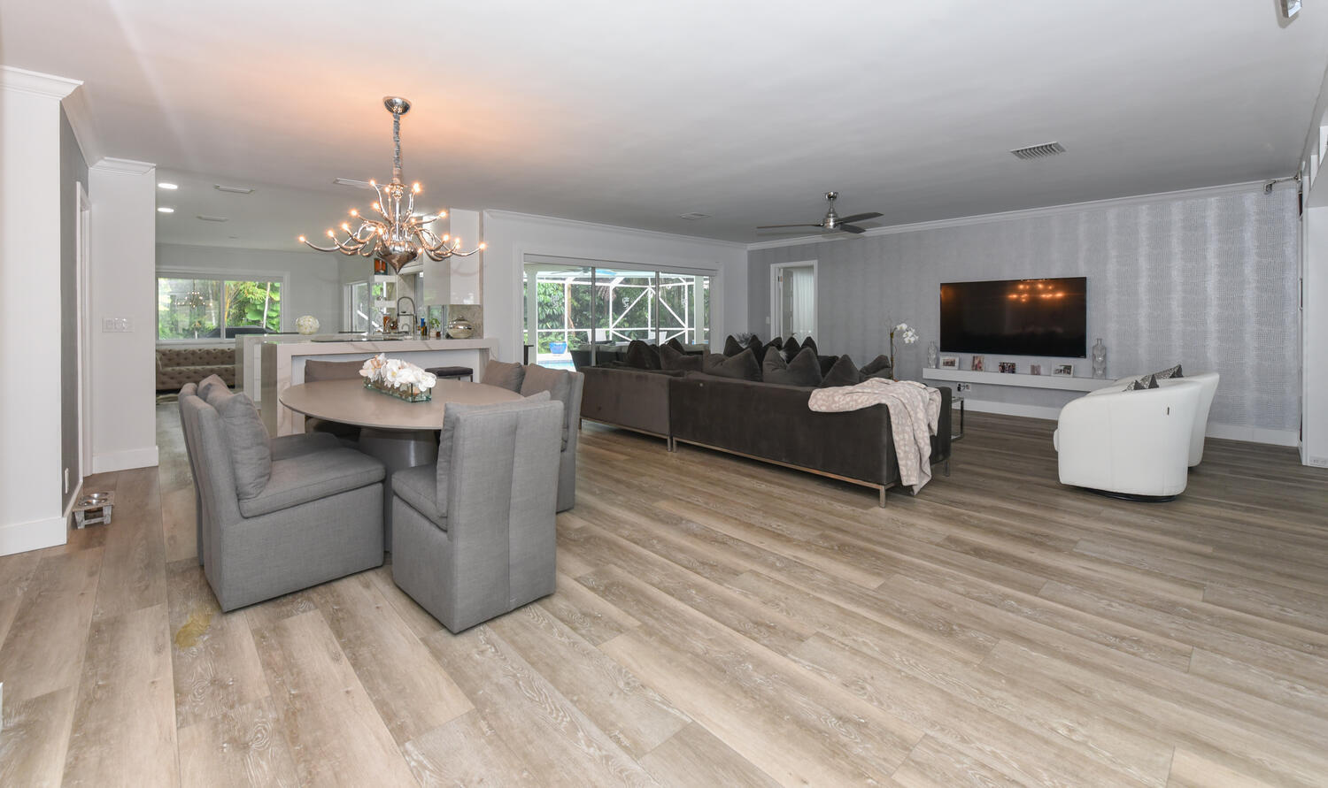 880 Hickory Terrace Boca Raton, FL 33486 - Photo 14 of 38 a living room with furniture and a flat screen tv