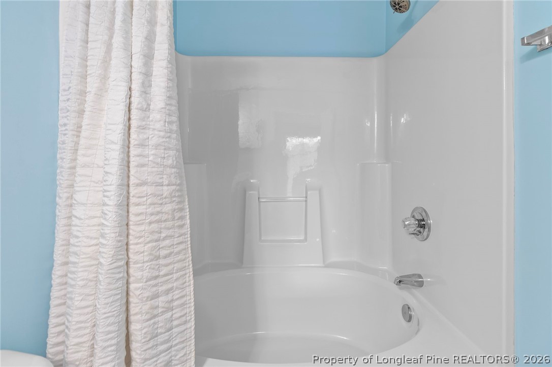 28 Coyt Circle Spring Lake, NC 28390 - Photo 28 of 41 a bathroom with a bathtub