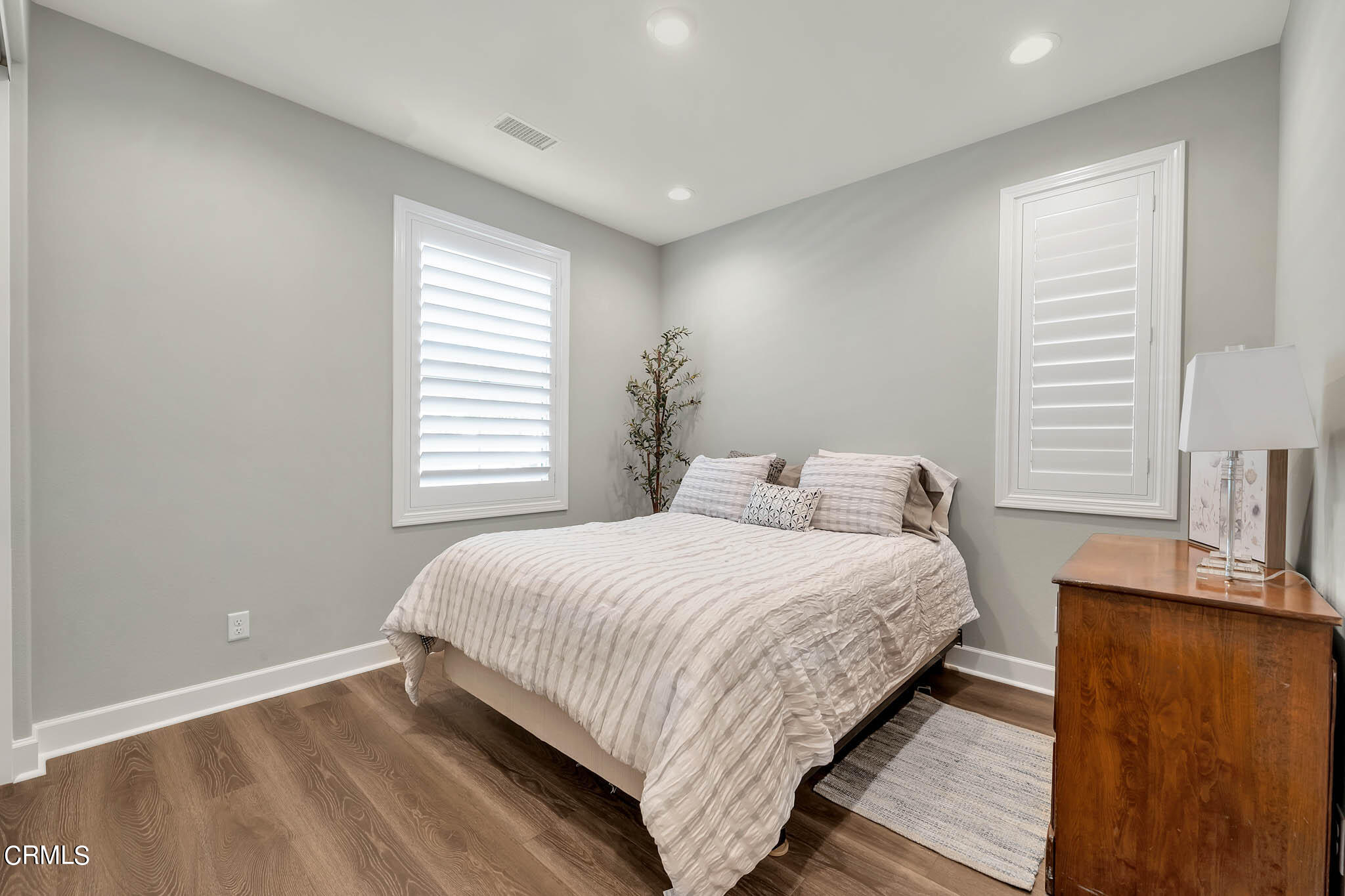 2450 Rondell Road Camarillo, CA 93012 - Photo 14 of 42 a bedroom with a bed and a couch