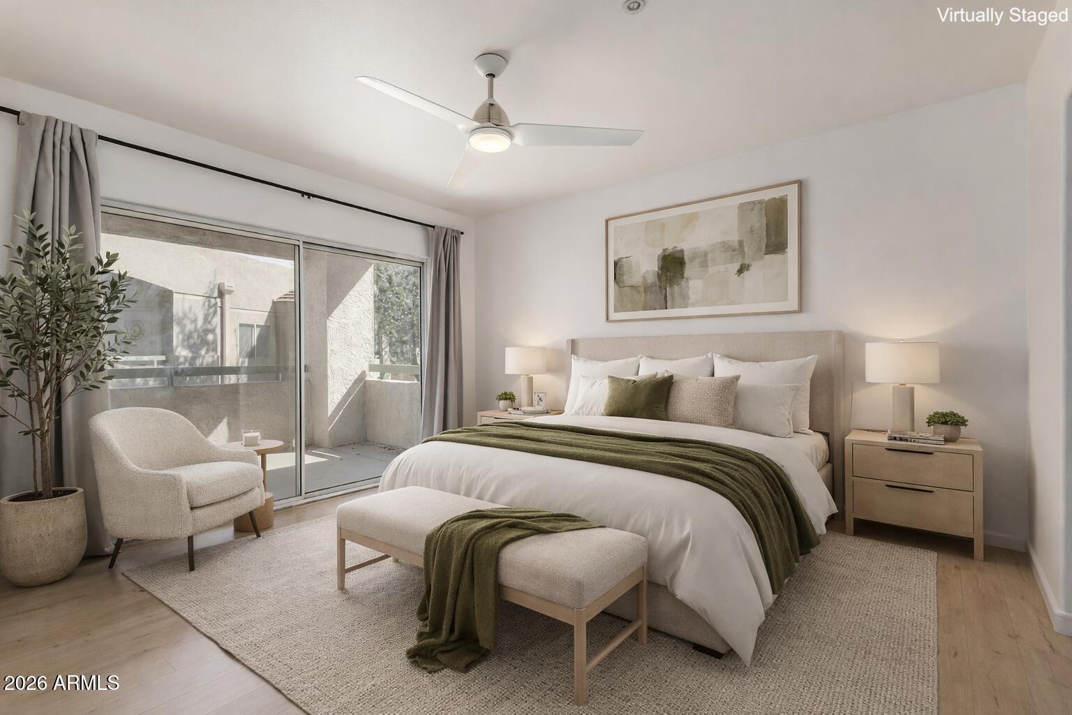 1295 North Ash Street, Unit 828 Gilbert, AZ 85233 - Photo 11 of 43 a bedroom with bed and a large window