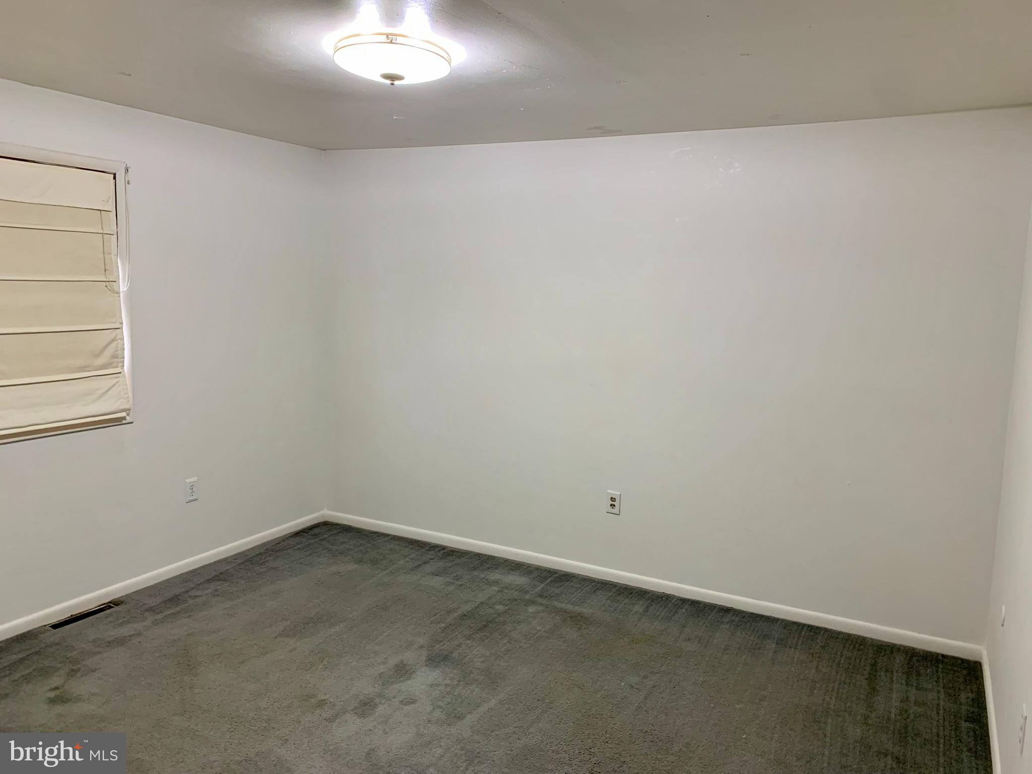 1207 Scott Street Reading, PA 19611 - Photo 11 of 25 an empty room with a window