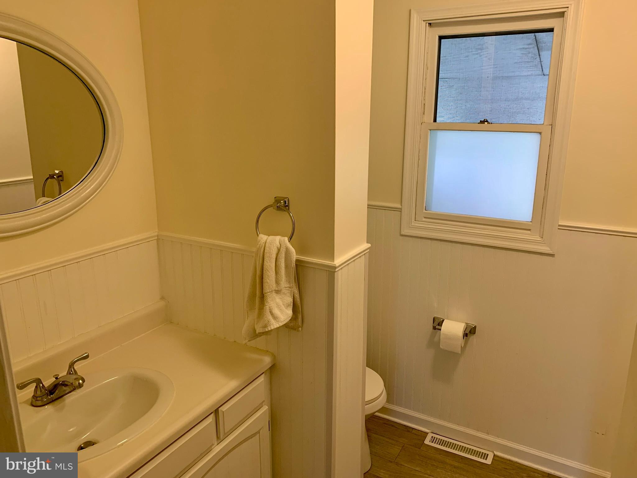 1207 Scott Street Reading, PA 19611 - Photo 16 of 25 a bathroom with a sink and mirror
