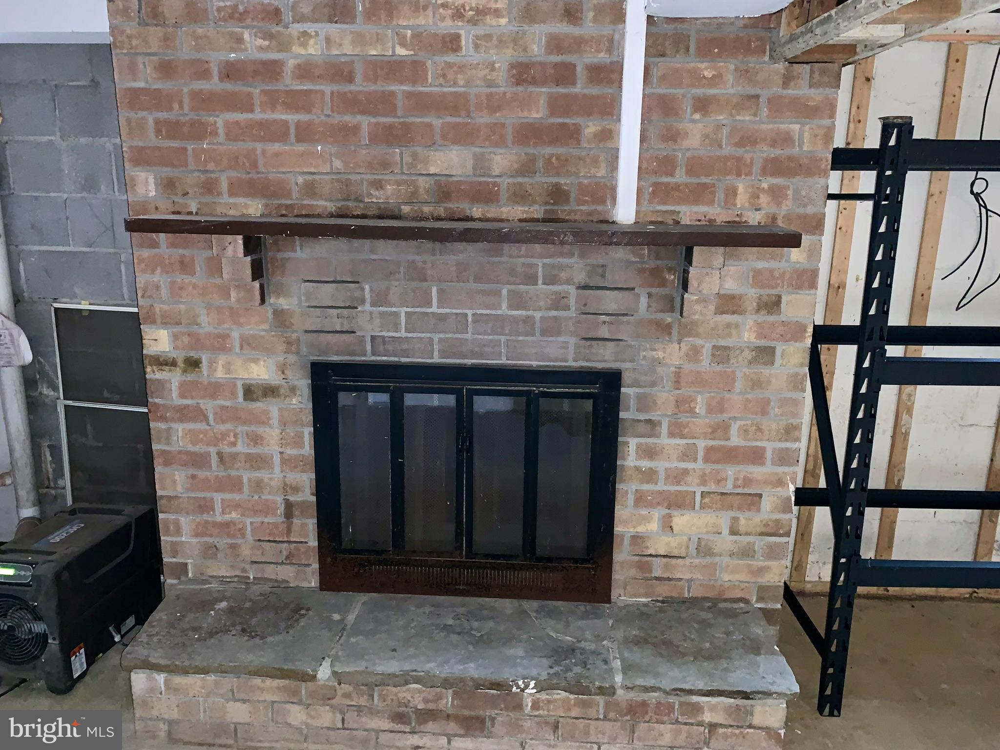 1207 Scott Street Reading, PA 19611 - Photo 19 of 25 a front view of a fireplace