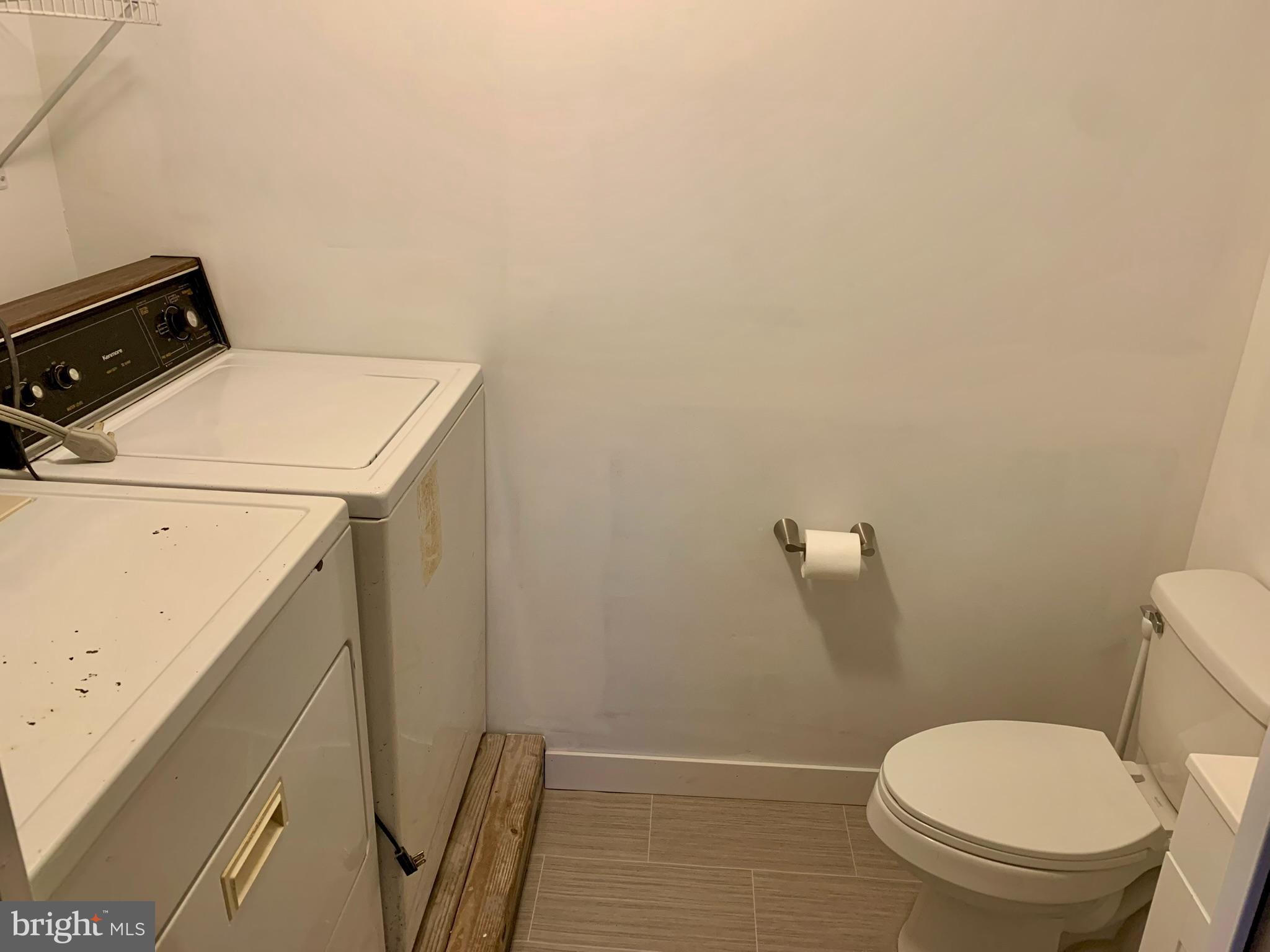 1207 Scott Street Reading, PA 19611 - Photo 20 of 25 a bathroom with a toilet and a sink