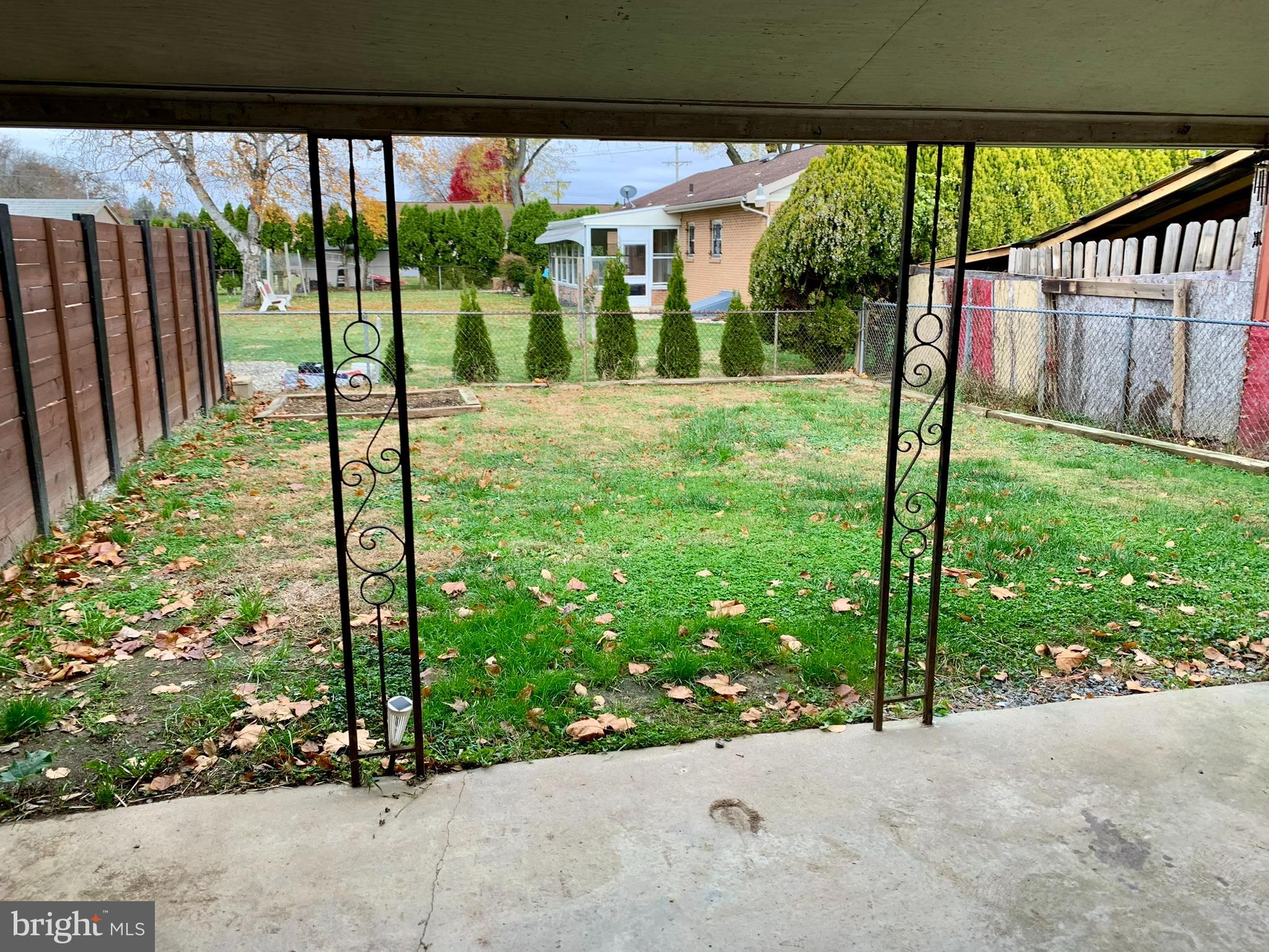 1207 Scott Street Reading, PA 19611 - Photo 23 of 25 a view of a backyard with a garden