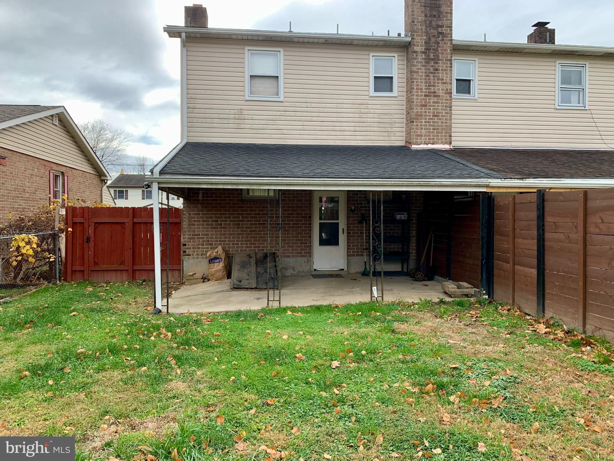 1207 Scott Street Reading, PA 19611 - Photo 24 of 25 a front view of a house with patio
