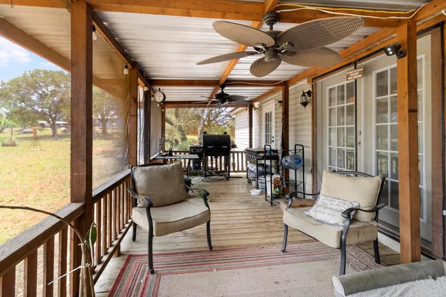 a house with trees in the background