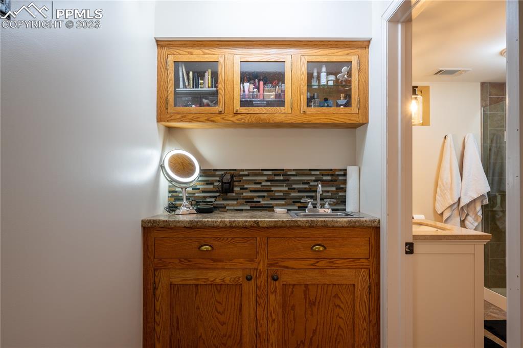 24141 Eccles Street Elbert, CO 80106 - Photo 12 of 37 a view of a kitchen with a sink and cabinets
