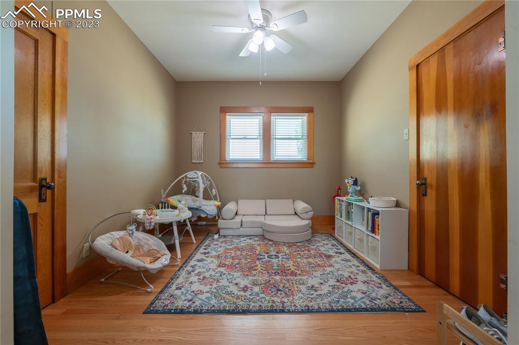 24141 Eccles Street Elbert, CO 80106 - Photo 30 of 37 a living room with furniture rug and window