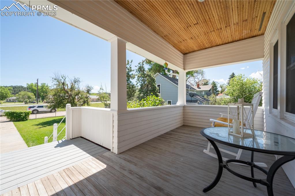 24141 Eccles Street Elbert, CO 80106 - Photo 36 of 37 a view of a patio with a table chairs and a patio
