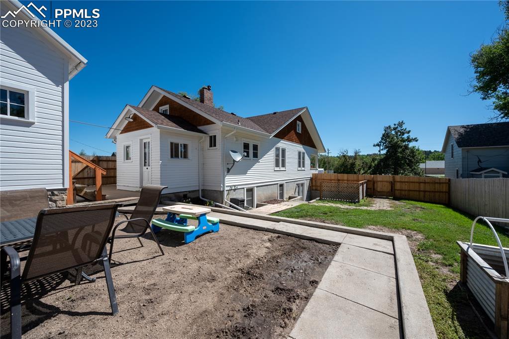 24141 Eccles Street Elbert, CO 80106 - Photo 4 of 37 a front view of a house with garden