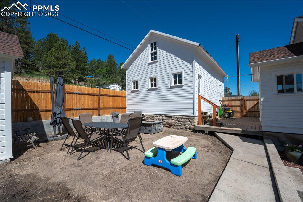 24141 Eccles Street Elbert, CO 80106 - Photo 6 of 37 a outdoor space with patio furniture