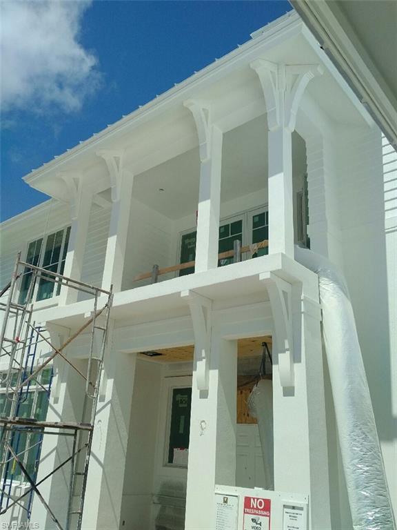 725 Riviera Drive Naples, FL 34103 - Photo 4 of 5 a front view of a house