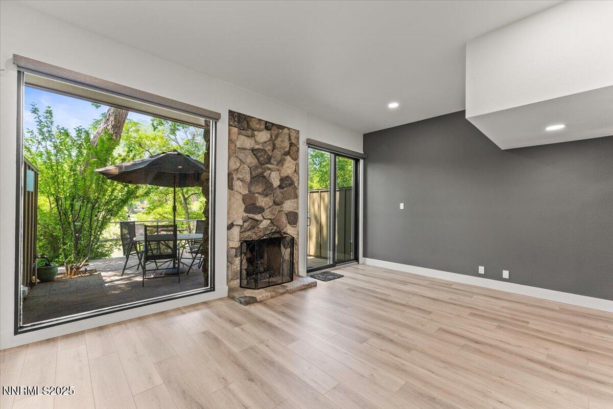 1308 Jones Street Reno, NV 89503 - Photo 9 of 47 a view of an empty room with wooden floor and a window
