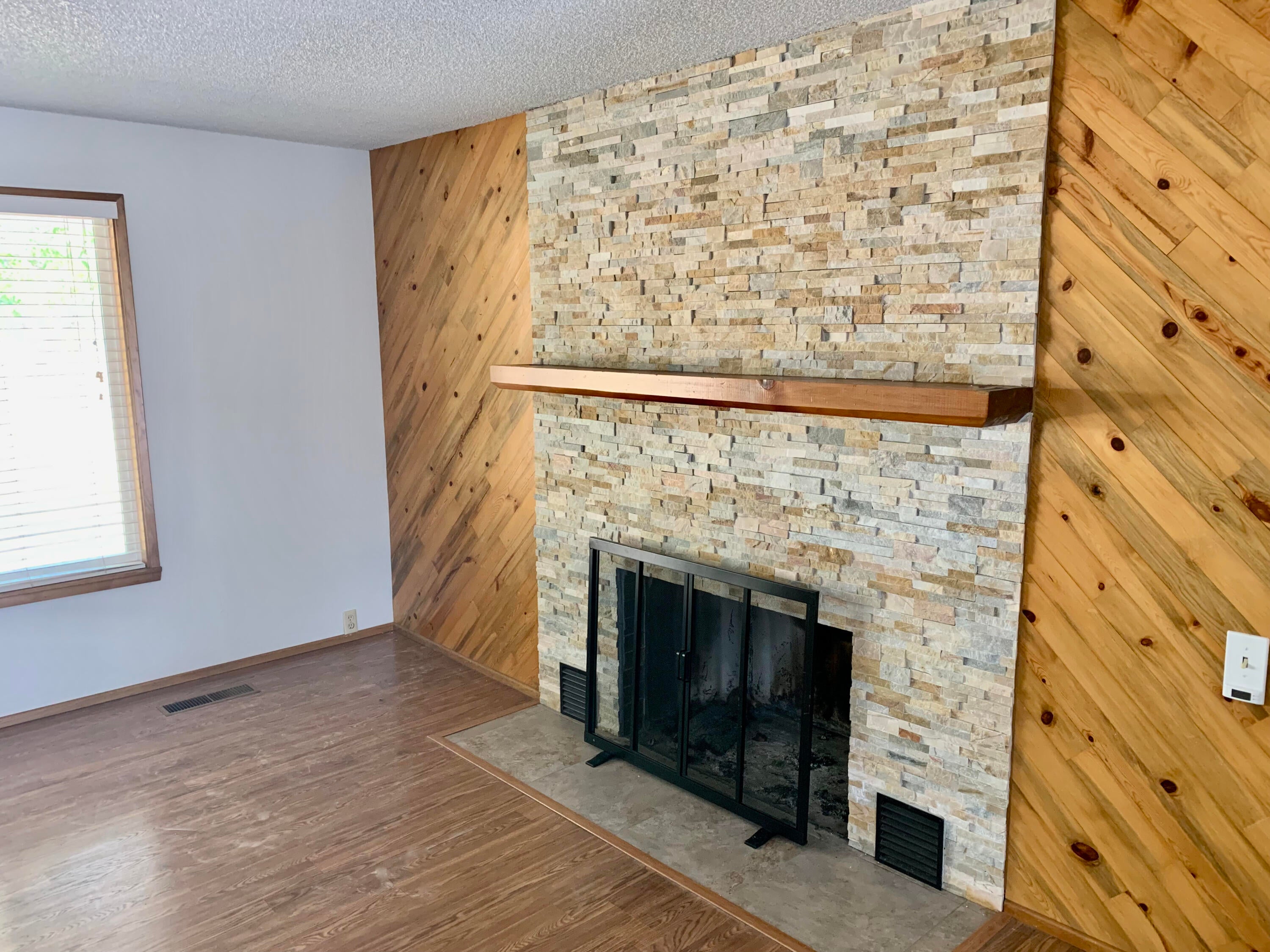 21662 Old Red Road Bend, OR 97702 - Photo 16 of 49 Living Room Accent Wall and Fireplace