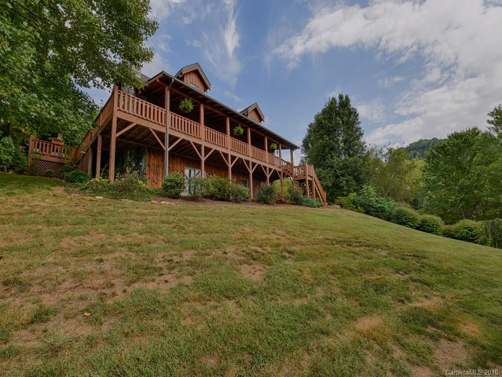 334 Ridgeview Lane Canton, NC 28716 - Photo 1 of 24 a front view of a house with a yard