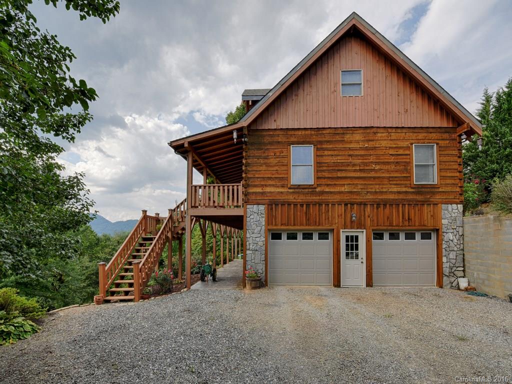334 Ridgeview Lane Canton, NC 28716 - Photo 2 of 24 a view of a house with a yard and balcony