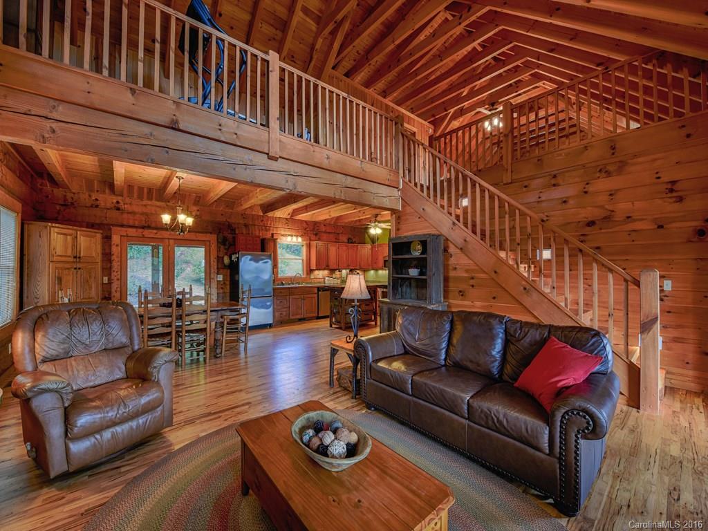 334 Ridgeview Lane Canton, NC 28716 - Photo 11 of 24 a living room with furniture and a ceiling fan