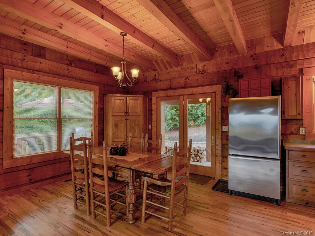 334 Ridgeview Lane Canton, NC 28716 - Photo 15 of 24 a view of a dining room with furniture window and wooden floor