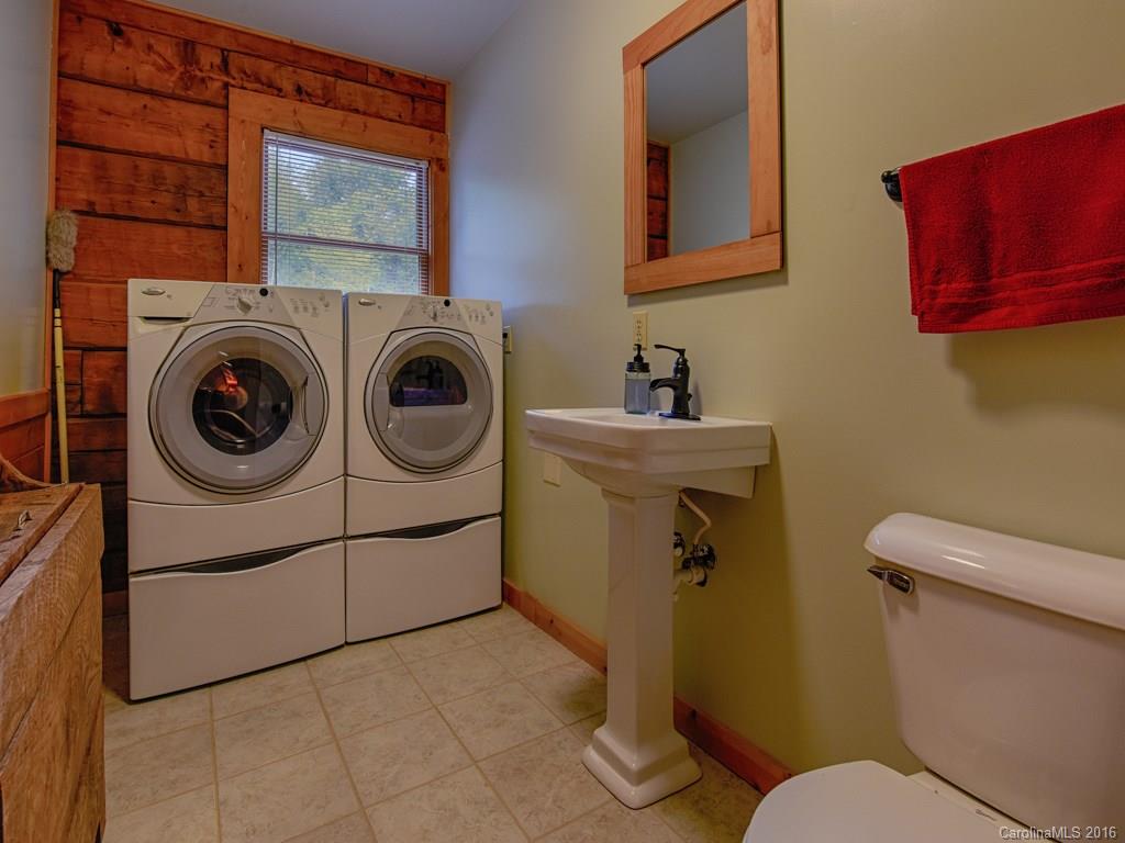 334 Ridgeview Lane Canton, NC 28716 - Photo 23 of 24 a utility room with dryer and washer