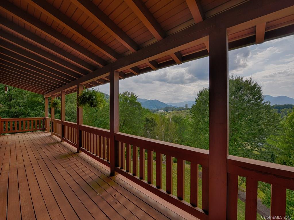 334 Ridgeview Lane Canton, NC 28716 - Photo 5 of 24 a view of a balcony with wooden floor