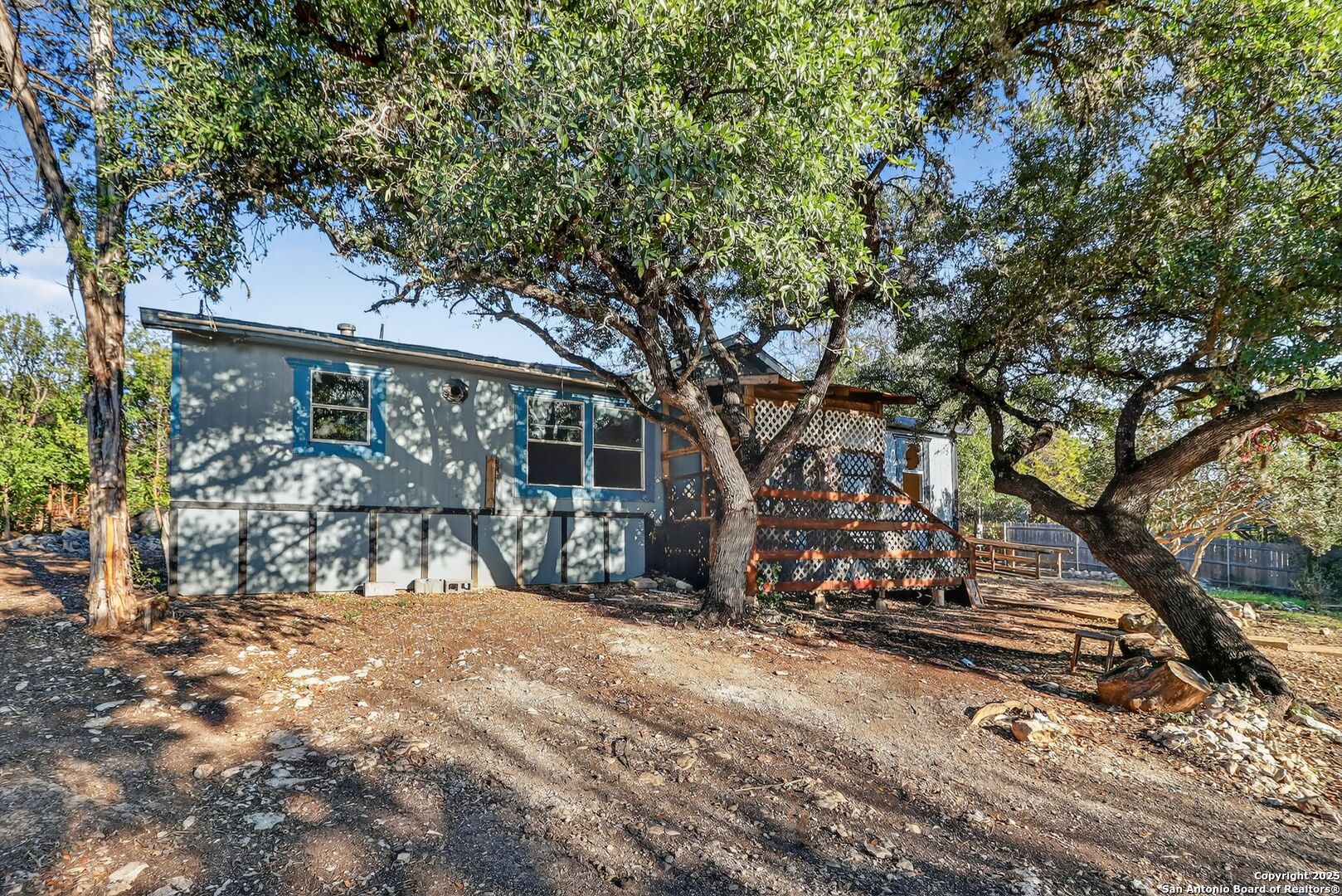 833 High Drive Spring Branch, TX 78070 - Photo 1 of 30 a view of a house with a tree in the background