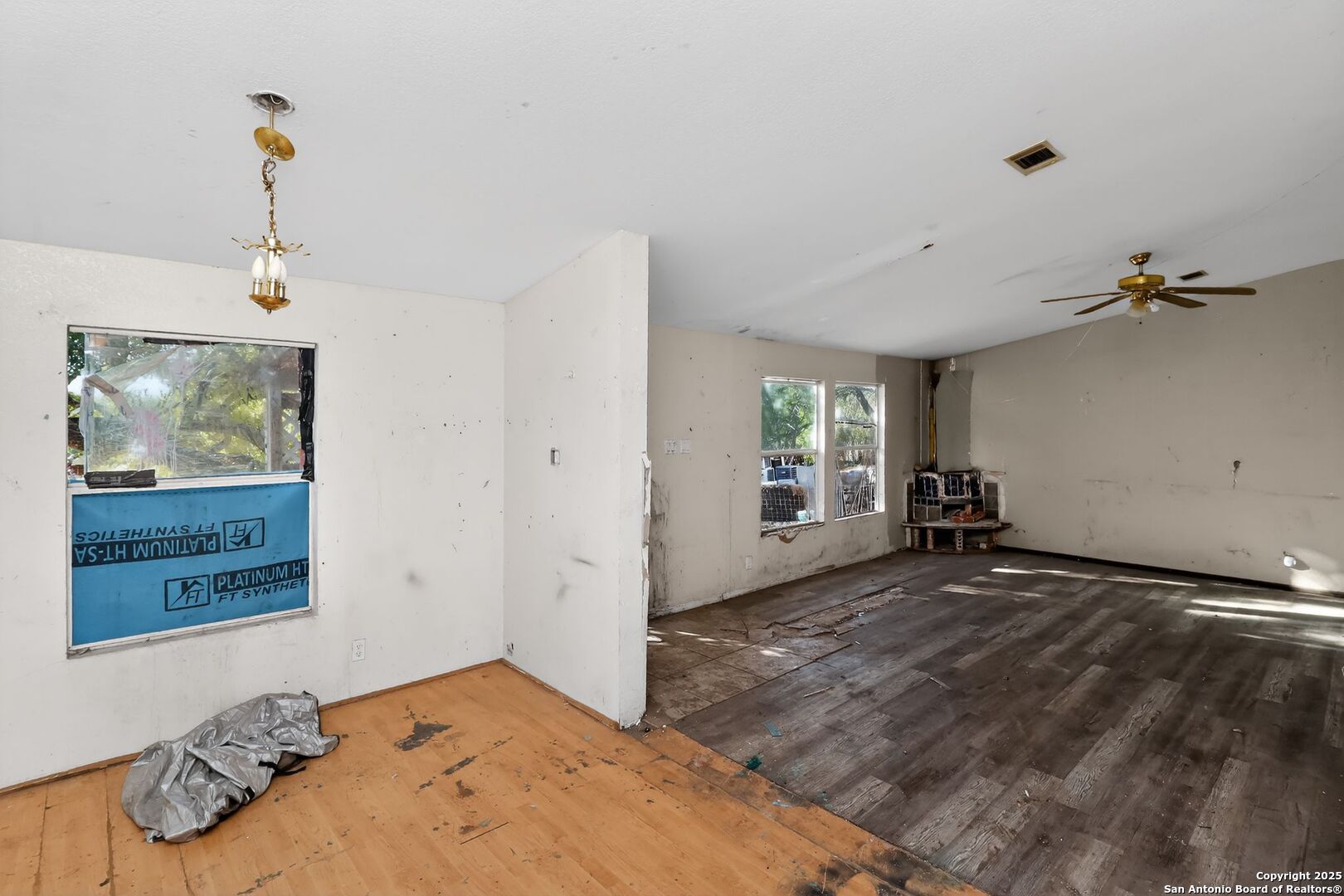 833 High Drive Spring Branch, TX 78070 - Photo 12 of 30 a view of a livingroom with wooden floor and window