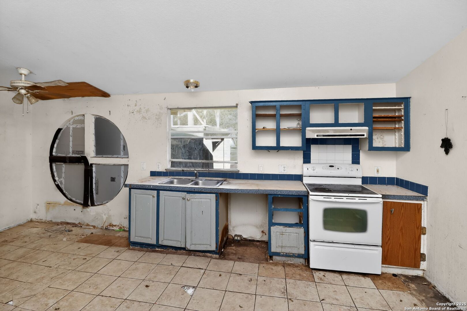 833 High Drive Spring Branch, TX 78070 - Photo 17 of 30 a kitchen with a sink a stove and cabinets
