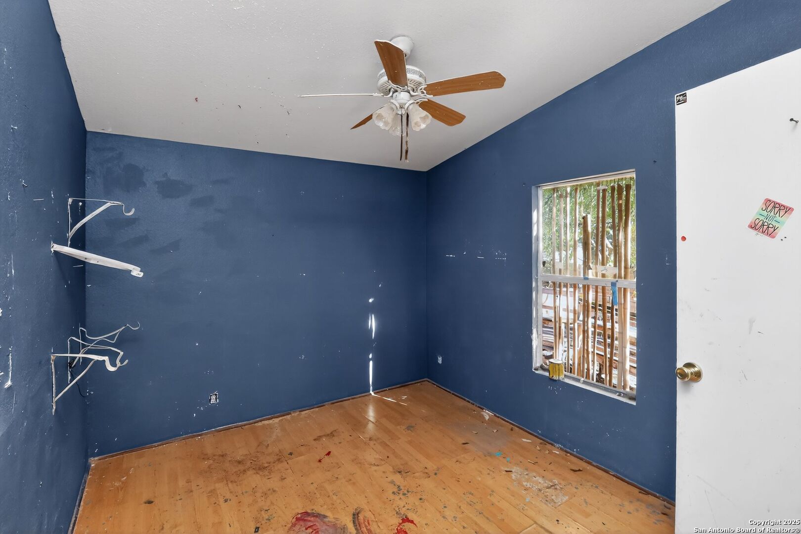 833 High Drive Spring Branch, TX 78070 - Photo 19 of 30 a view of a livingroom with a ceiling fan and window