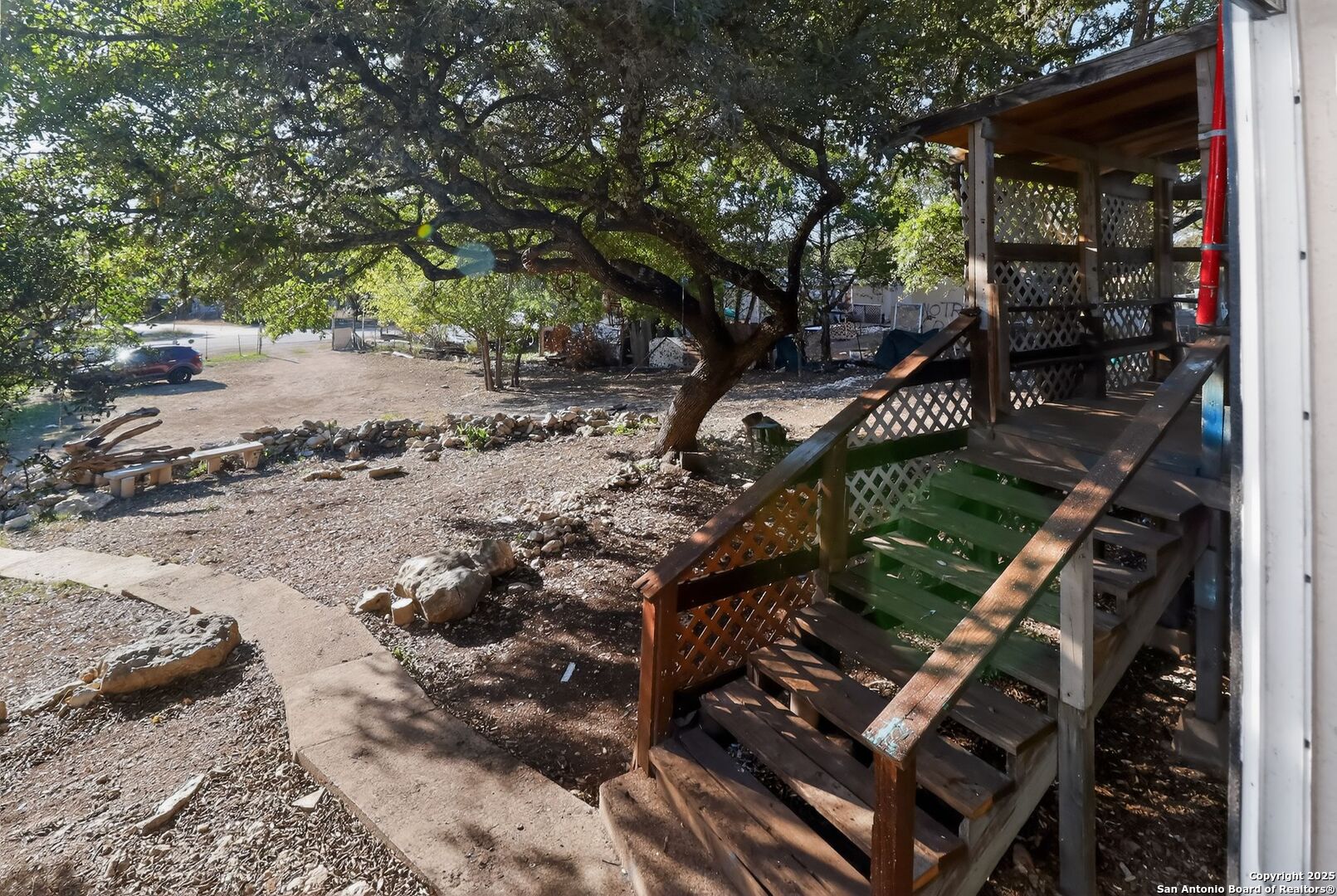 833 High Drive Spring Branch, TX 78070 - Photo 6 of 30 a backyard of a house with lots of green space