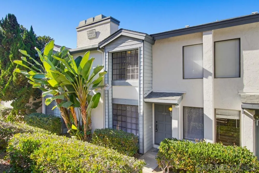 8868 Regents Road, Unit 103 San Diego, CA 92122 - Photo 4 of 50 a front view of a house with a garden