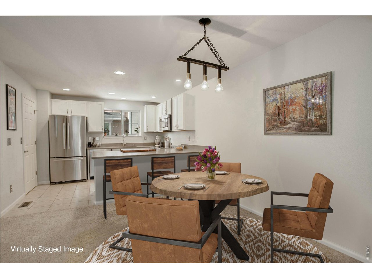4116 Riley Drive Longmont, CO 80503 - Photo 11 of 33 Dining Room is open to the kitchen - great for entertaining (Virtually Staged)